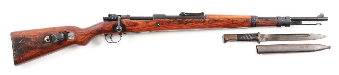 (C) Steyr WWII Nazi German 98k Mauser Rifle With: Gun retains 90% of an arsenal applied finish. Import marked on the bottom of the barrel. Matching numbers, although the stock and bolt are force matched as commonly seen on Russian capture guns. This 