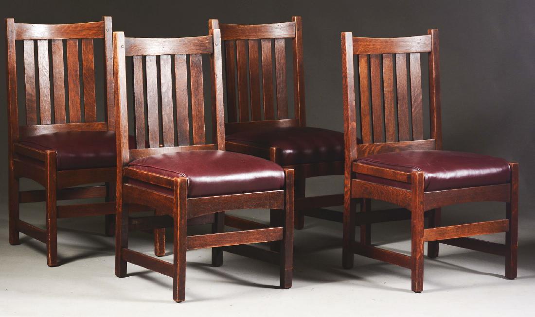 Set Of Four L&JG Stickley Hip-Rail Dining Chairs, No.: Set of Four L&JG Stickley Hip-Rail Dining Chairs in quartersawn oak, model No. 424. Pinned mortise and tenon construction with arched stretchers and original drop-in spring cushion seats. New replaced