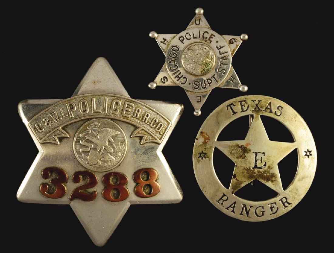 Lot Of 3: Law Enforcement Badges.: The lot includes two badges from Chicago and one from the Texas Rangers. The two Chicago badges are marked "CH Hansen". From the Ray Bentley Collection. Condition: Dimensions: Largest: 3 - 1/2".