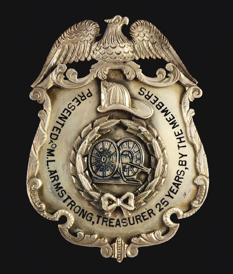 Sterling Presentation Badge.: Sterling silver, jeweler's engraved presentation badge for 25 years. Presented to the Treasurer of a Hose Company, 1881 - 1906. From the Ray Bentley Collection. Condition: Dimensions: 2 - 3/4".