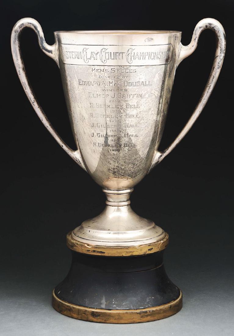 Berkeley Bell Clay Court Championship Trophy and: From the Estate Collection of Berkeley Bell who was a high ranked amateur in the 1930's and a professional doubles player reaching the U.S. Open finals twice. Included is a large two handled trophy fo