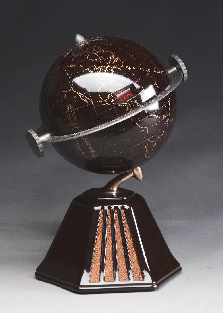Raymond Loewy designed Colonial Model 700 New World: Colonial Model 700 New World Globe Radio also known as the Mephisto. This incredible world globe radio was designed by Raymond Loewy in 1933 and built in Buffalo New York and Long Island New York. In 