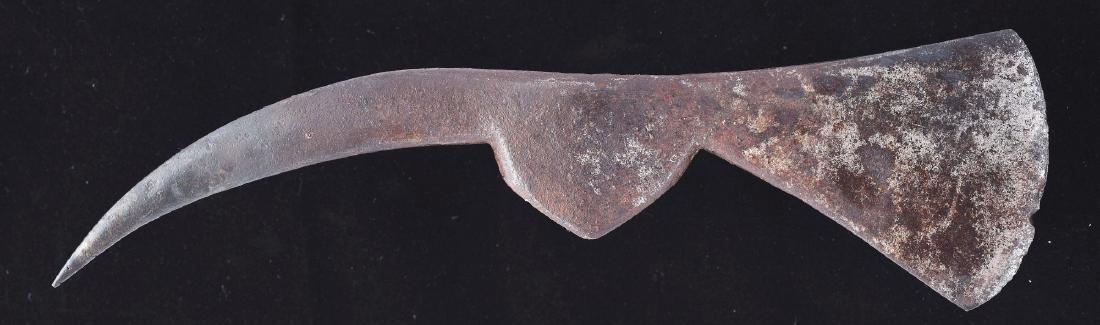 Large 18th Century Spike Tomahawk Head with Fort: The head measures 9-1/4" overall with a 2-1/2" edge. Hand forged construction with 4-1/4" flat curved spike. Narrow rectangular eye. For similar examples, see plates 68 and 76 of Harold L. Peterson's