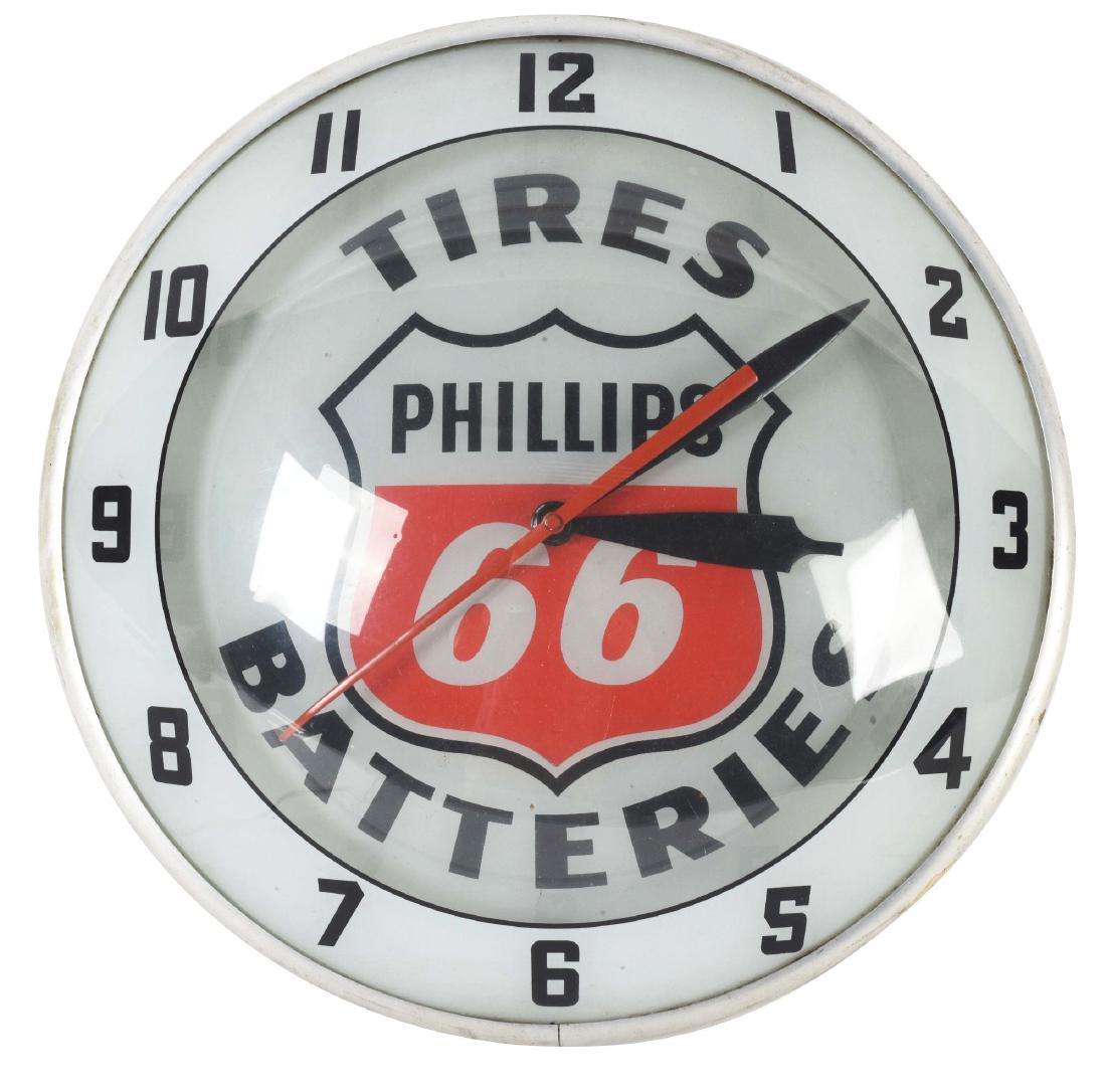 Phillips 66 Tires & Batteries Advertising Products: Light up bubble clock made by Advertising Products for Phillips 66 Tires & Batteries. Clock is in excellent working condition, and lights up nicely. Clock shows only a light amount of wear on the body