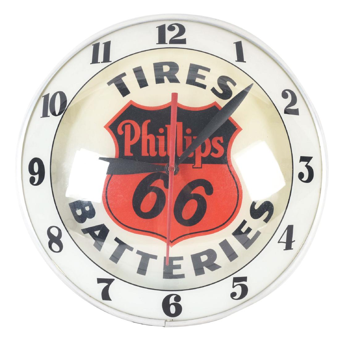 Phillips 66 Tires & Batteries Advertising Products: Light up bubble clock made by Advertising Products for Phillips 66 Tires & Batteries. Clock is in excellent working condition and lights up nicely. Clock shows only a light amount of wear on the body