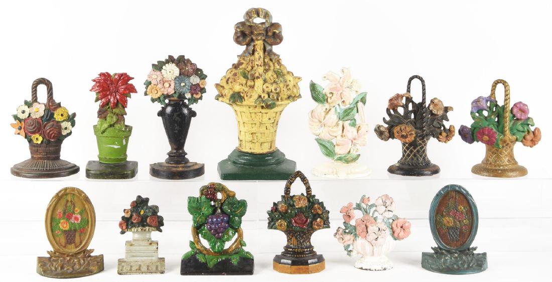Lot of 13: Assorted Cast Iron Flower Doorstops. (1 of 1)