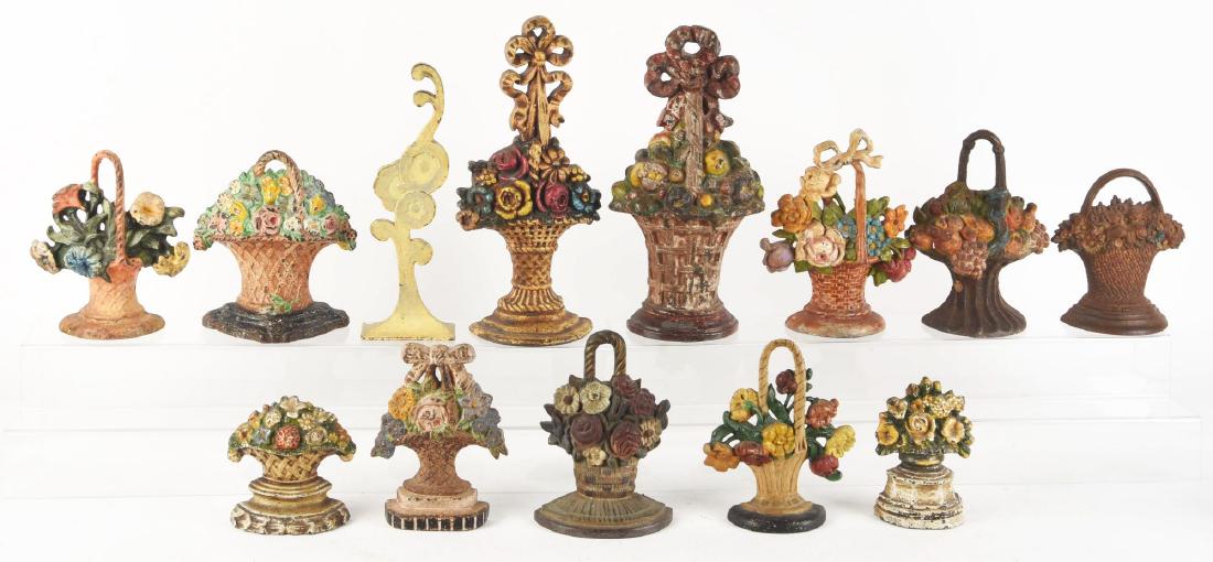 Lot of 13: Cast Iron Assorted Flower Doorstops. (1 of 1)