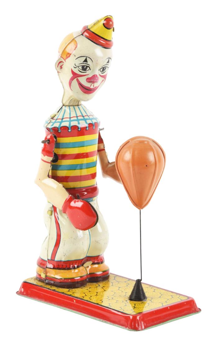 Chein Tin Litho Wind-Up Clown Puncher Toy. (1 of 2)