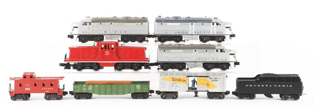 Lot of 8: Two Union Pacific Alco Diesels and Assorted: Lot consists of: No. 2023 Powered Union Pacific Alco - complete and all original, some scratches and paint chips, in very good condition. MPC Tender - marked PRR, whistle installed, in fair condition.
