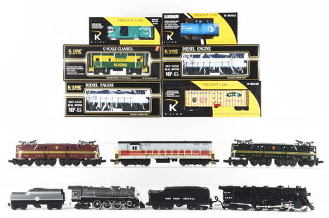 Lot Of 12: K-Line Locomotive & Rolling Stock In Boxes.: Lot consists of: two K-Line MP15 Ford New Holland Diesels, Reading O Scale Caboose, K-Line Great Northern Aluminium Tank Car and NYC Boxcar, K-Line Heinz Wood-Side Reefer, K-Line New York Central Huds