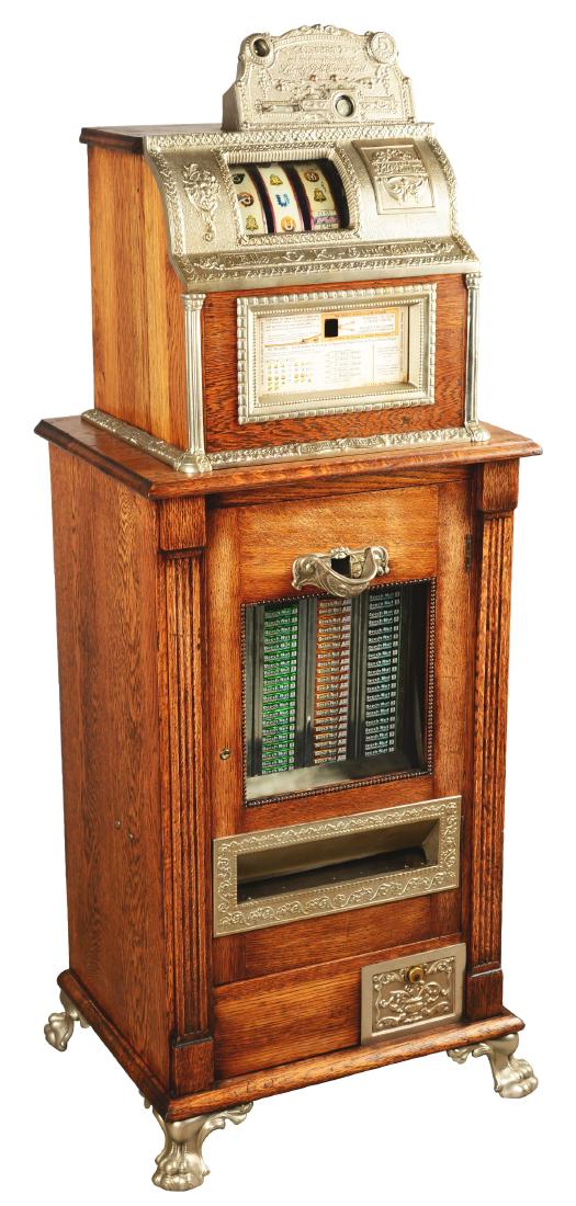 **5¢ Mills O.K. Automatic Gum Vender Trade Stimulator.: This three reel floor model machine features four lower vending columns and advertises rewards in trade checks and/or gum for each nickel inserted but plays like a slot machine. Excellent appearance o