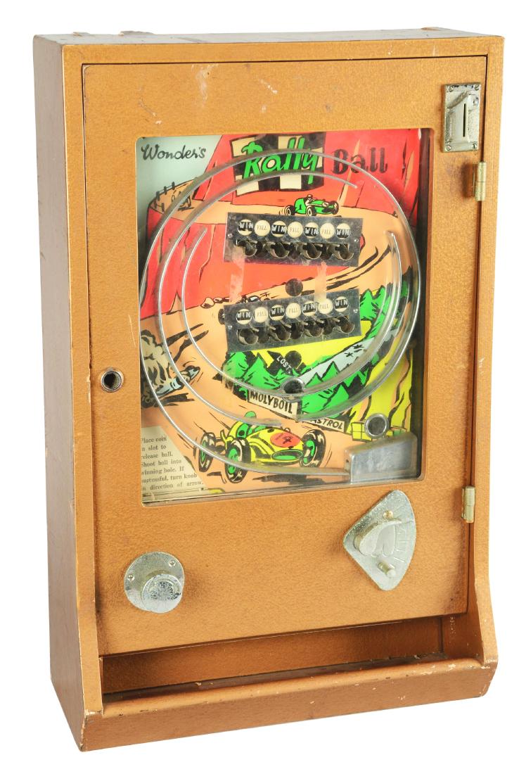 1D Wonder's Rally Ball Arcade Game.: A tabletop flip ball game, similar to an Allwin's cabinet and style. The interior is clean and features a colorful graphic with a mountain race car theme. Shoot the ball into any of the "Win" pockets