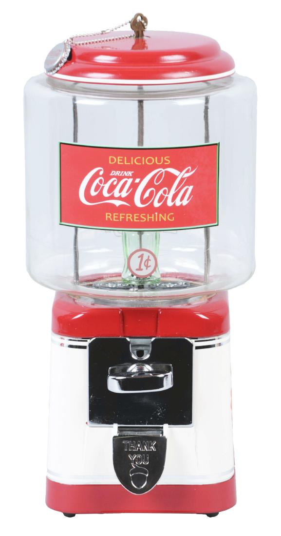 1¢ Oak Mfg. Co. Coca Cola Gumball Vending Machine.: This Acorn countertop vending machine has been professionally restored in a Coca Cola motif with a miniature Coke bottle within the large cylindrical glass globe. In excellent condition throughout. In