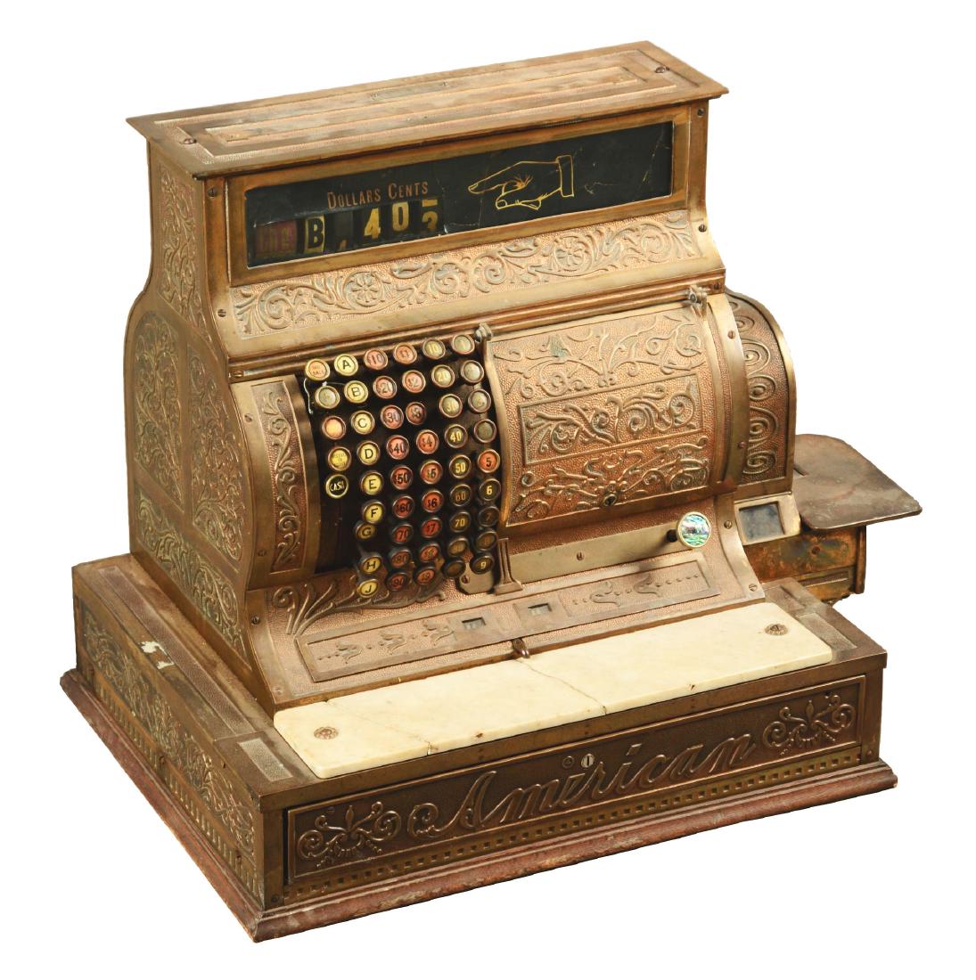 American Cash Register Co. Cash Register.: Brass register, manufactured by American of Ohio and remains all in its original condition. It has an incredible gilt housing, displaying wear commensurate with its age. It has a stone top above the c