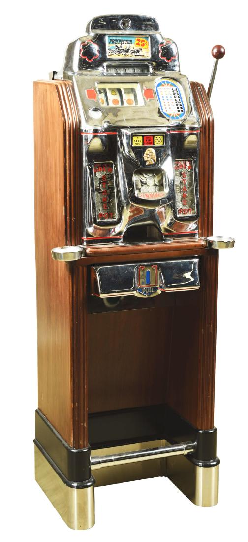 **25¢ O.D. Jennings Prospector Console Slot Machine.: A floor model console slot machine, manufactured by O.D. Jennings in 1946. The wooden unit is new with a dark finish and the slot machine has a cast aluminum front in chrome, detailed in red. There is