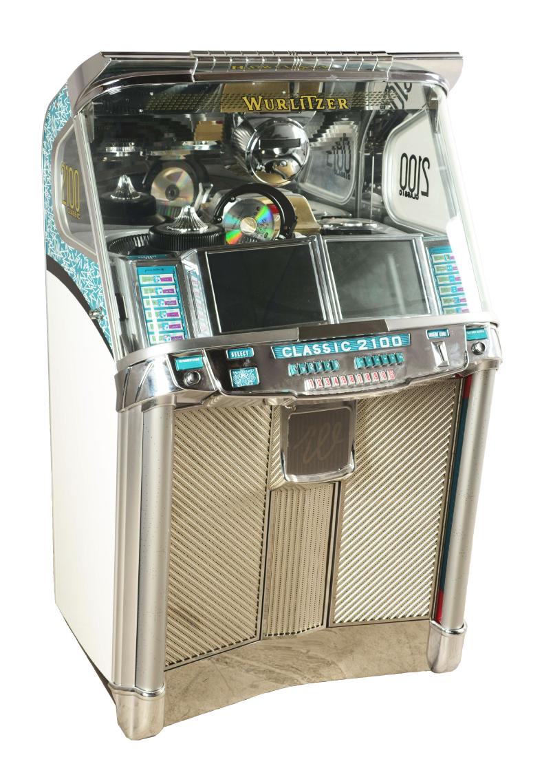 Coin-Op Wurlitzer 2100 Classic Jukebox.: This restored beauty is super clean and has been retrofitted to play CDs from 99 available slots. Serial No. 47059095. One key is included. Condition: (Restored). Dimensions: 29"L x 35"W x 55-3/4"T.