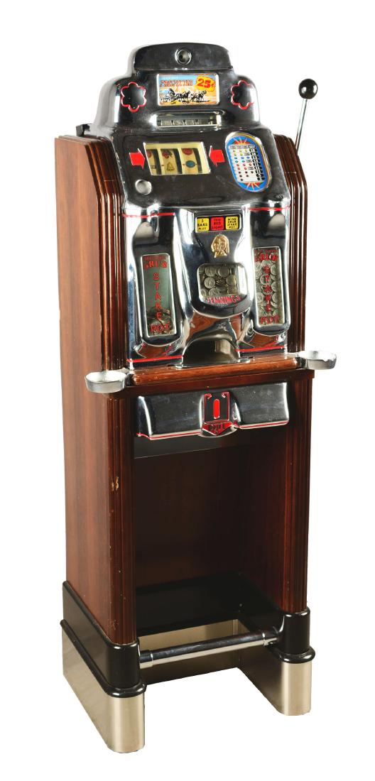 **25¢ O.D. Jennings Prospector Console Slot Machine.: A floor model console slot machine, manufactured by O.D. Jennings in 1946. The reproduction wooden unit has a dark finish and the original slot machine has a cast aluminum chrome front, detailed in re