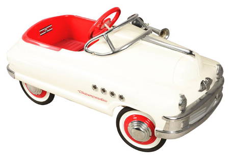 Pressed Steel Murray "Torpedo" Pedal Car.: Restored pressed steel pedal car, manufactured by Murray in the 1940s. Colored in white, detailed in red and black with chrome elements. Finished with a horn, red steering wheel and a faux leather sea