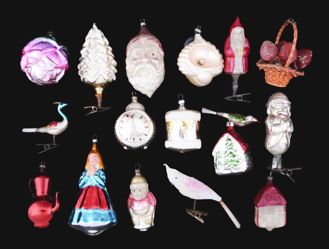 Lot of Christmas Ornaments.: Includes a Brownie on a clip, a Santa head, toboggan boy, Santa on a clip, tree on a clip, seashells, clocks, houses, flowers and birds. Some paint loss on some, and some chipping to the pikes of the 