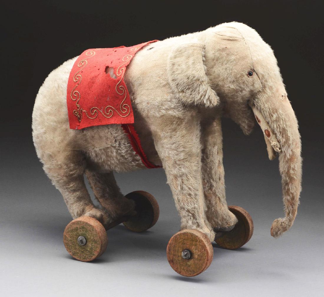 Early Stuffed Elephant On Wheels. (1 of 2)