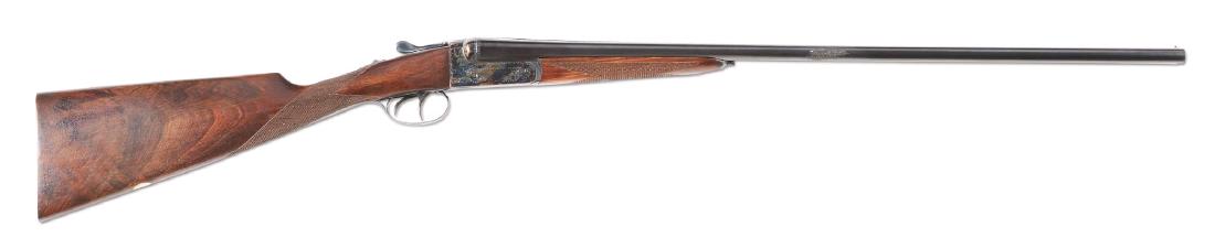(M) Dainty AYA SxS 28 Gauge Shotgun imported by IGI: This gun features 27" fluid steel barrels with plain rib and brass front bead. The muzzle end has a ring of light engraving and barrel flats show usual proof markings and serial number. The case harde