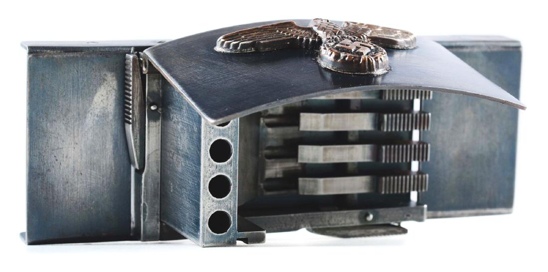 (C) German WWII Koppelschloss Belt Buckel Pistol cal,: *INTERESTING GERMAN BELT BUCKLE GUN. SN 68. Cal. 22LR. Nefarious undercover weapon consisting of 4-bbl derringer which is hinged to hide under flip-up cover. When in desperate situation, wearer can pr