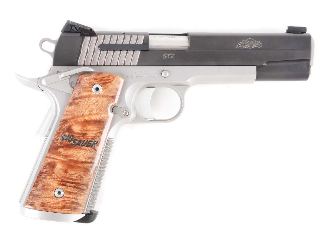 (M) Sig Sauer 1911 STX Semi-Automatic Pistol.: Offered for sale is an excellent Sig Sauer 1911 STX, featuring a short dust cover frame, adjustable blacked out rear sight with night front sight, burled maple grips, flat topped slide, oversized magw