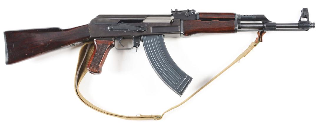 (M) Polytech Legend Series AK-47/S Semi Automatic: Pre- Ban manufacture imported between 1988-1989. Military finish on milled receiver. Graduated rear sight with fixed front sight. Red finished wood stocks with cleaning kit in butt. Comes with 3 polyt