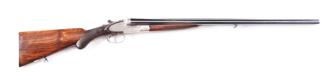 (C) Bernardelli Deluxe Sidelock Ejector Shotgun: 27 - 3/4" Shoe lump barrels are fitted with slightly raised, matted rib. Steel type and makers name are engraved on tops. Engine turned barrel flats are stamped with 1941 Italian nitro proofs for 2 - 