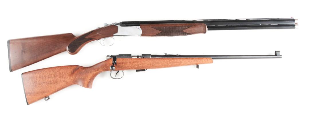 (M) Lot of 2: CZ Bolt Action Rifle and Over Under: A) CZ-USA Canvasback 103D O/U shotgun made in Turkey by Huglu. Polished silver Boss lug style frame with engraved polished triggerguard. Blued barrels with ventilated rib, Tru-glo front sight and scre