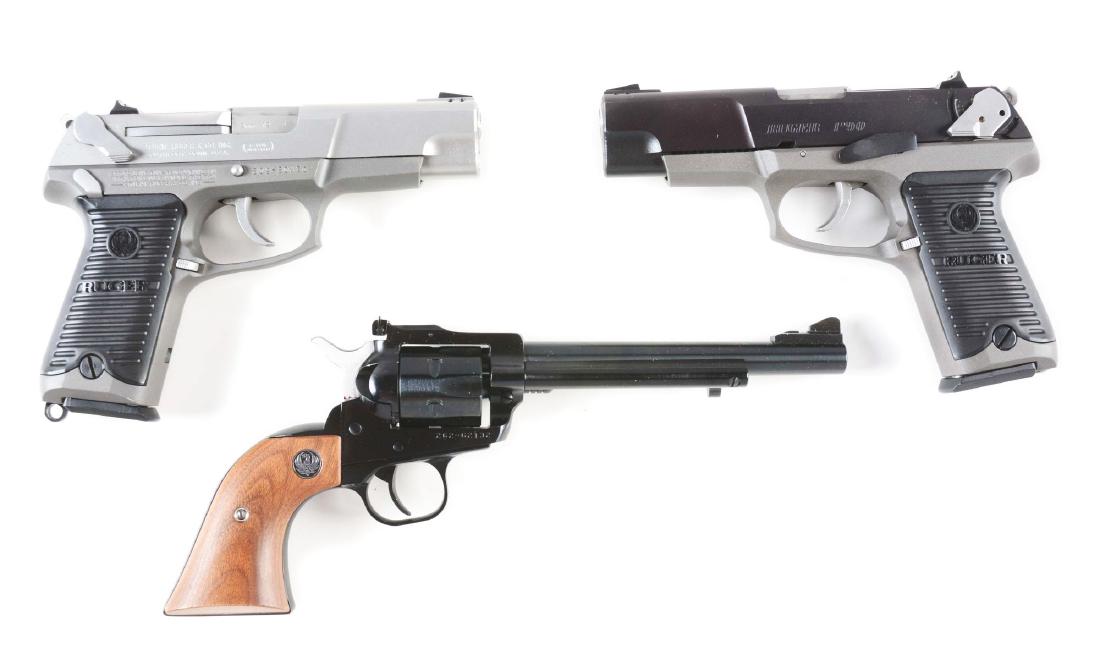 (M) Lot of 3: Boxed Ruger Firearms.: Gun (A) is a Model P89 features grey alloy frame, stainless slide, black composite grips, double action, white dot sights. CONDITION: Near new inside and out in box with paperwork and two magazines. G