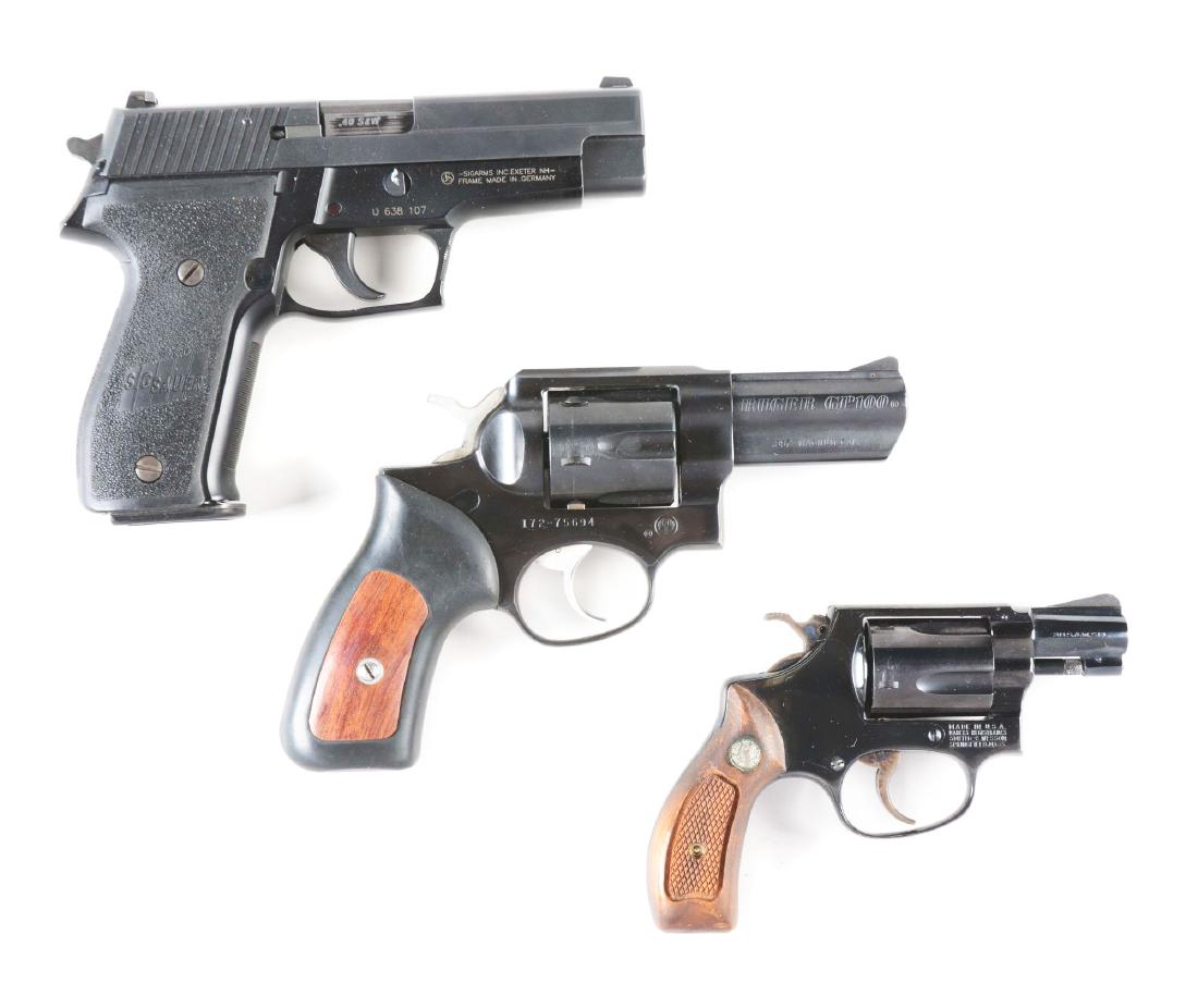 (M) Lot of 3: Sig P226, Smith & Wesson Model 36 & Ruger: Gun (A) is a Sig Sauer Model P226 made in Germany with alloy frame, steel slide, white dot sights, composite grips, double action. CONDITION: Near new inside and out. Gun (B) is a Ruger Model GP100 si