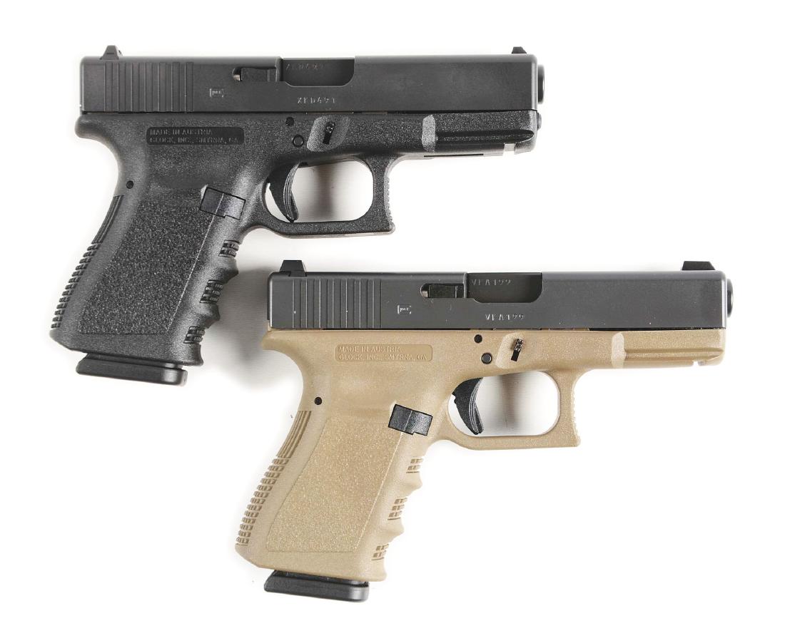 (M) Lot of 2: One NIB Gen 3 Glock 23 and One NIB Gen 3: A) Polymer frame Gen 3 Glock 23 with black finish and 13 round mag. Comes with black plastic factory case, extra mag, loader, cleaning brush and lock. B)Olive drab Glock 23 Gen 3 with black slide and