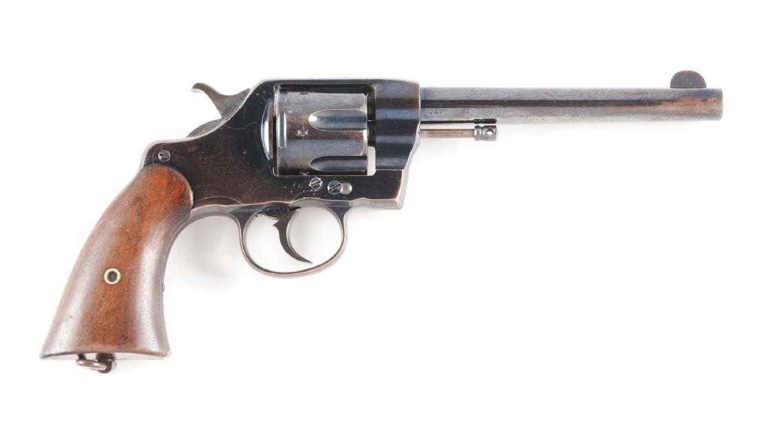 (C) Fine Colt U.S. Army Model 1901 Double Action: This revolver dates from the last series issue of 1903 and is dated on left side of frame. Left side of frame also bears the "JTT" inspector stamp for John Thompson and "RAC" for Renaldo Carr. Assembl