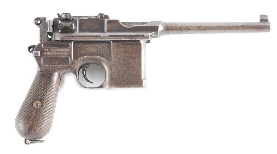 (C) Mauser C96 Broomhandle Semi-Automatic Pistol.: Features include; round barrel with post front sight. 50-1000 meter adjustable tangent rear sight. Ten round integral magazine fed by a stripper clip. Small ring hammer. Two piece wood grips. Stamped