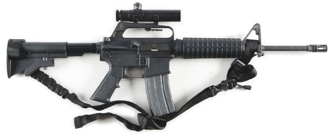 (M) DPMS AR-15 Semi-Automatic Rifle with Scope.: Standard CAR/AR configuration with collapsible butt and 16 inch carbine barrel with flash hider. A1 carry handle mounted with Barska 4X20 power Colt pattern scope. Receiver marked Cal, 223-5.56 Model 