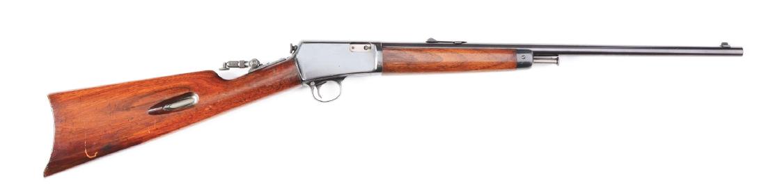 (C) Winchester Model 1903 Semi-Automatic Carbine: Features include round barrel, solid frame, sporting sights, Marble's tang sight, blued finish, straight grip walnut stock and smooth steel buttplate. This is a buttstock tube fed magazine rifle. COND