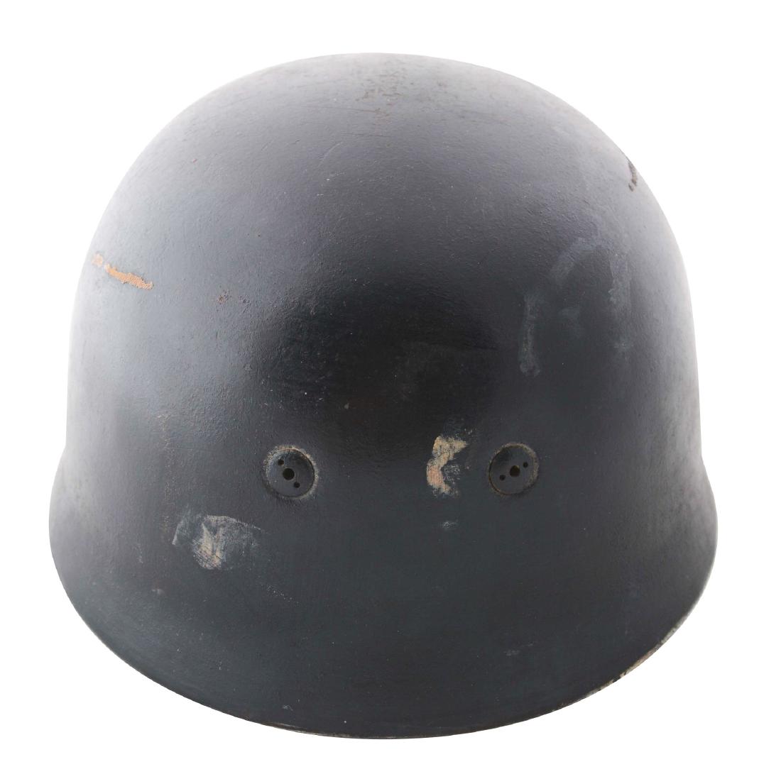 German WWII Repainted M38 Paratrooper Helmet Shell.: Original single decal Fallschirmjaeger helmet shell in overall good condition. The entire helmet, except the decal, has been brush painted in a black paint. The interior was then painted in a light ta