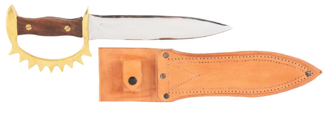 Rare WWII M.H. Cole 9 Point Knuckle Knife with: WWII Cole 9 Point Knuckle Knife with brass guard and walnut grips, measuring 13" overall with a 8-1/8" spearpoint blade. M.H.Cole made between 50 to 75 of the early 9 point knives, total knives produc