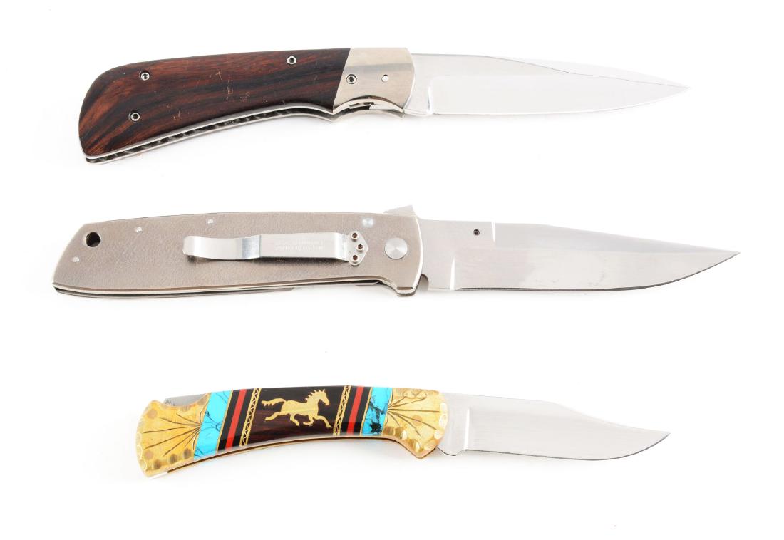 Lot of 3: Randal Gilbreath Folder with Liner Lock, Buck: Lot contains: (A) Randall Gilbreath Liner lock folder serial number 00. 9-1/2" overall with a 4-1/2" blade with false top edge. Clip mount holder and assist opener on top of blade. Stainless steel con