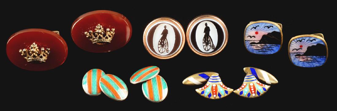 Lot Of 5: Pairs Of Cuff Links.: Lot includes: a pair of Carnelian and silver gilt cuff links, 1-1/4"; one with a man on a high wheeled bicycle pair, cameo cut and 3/4" in diameter; an Egyptian Revival pair with enamel work, 3/4" wid