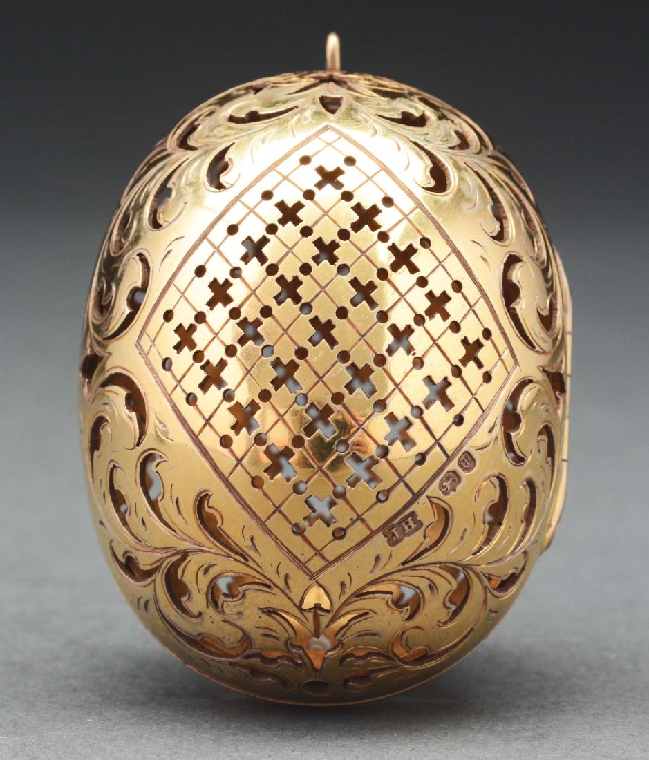 Large Boxed Silver Gilt Pierced Egg Shape Pomander.: Pomander is hinged at the side with a ring at the top for a chain. Hallmarked. Includes a fitted box. Condition: (Excellent). Item Dimensions: 2 -1/4" x 2".