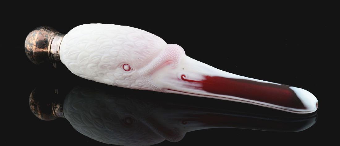 Rare Thomas Webb Cameo Glass Perfume Of Swan.: Swan has ruby glass bill and finely cut feathers with a sterling hinged lid with hallmarks and original stopper. Marked "Rd 11109" and is 9" long. Circa 1880's with no damage or repairs. Condition: It