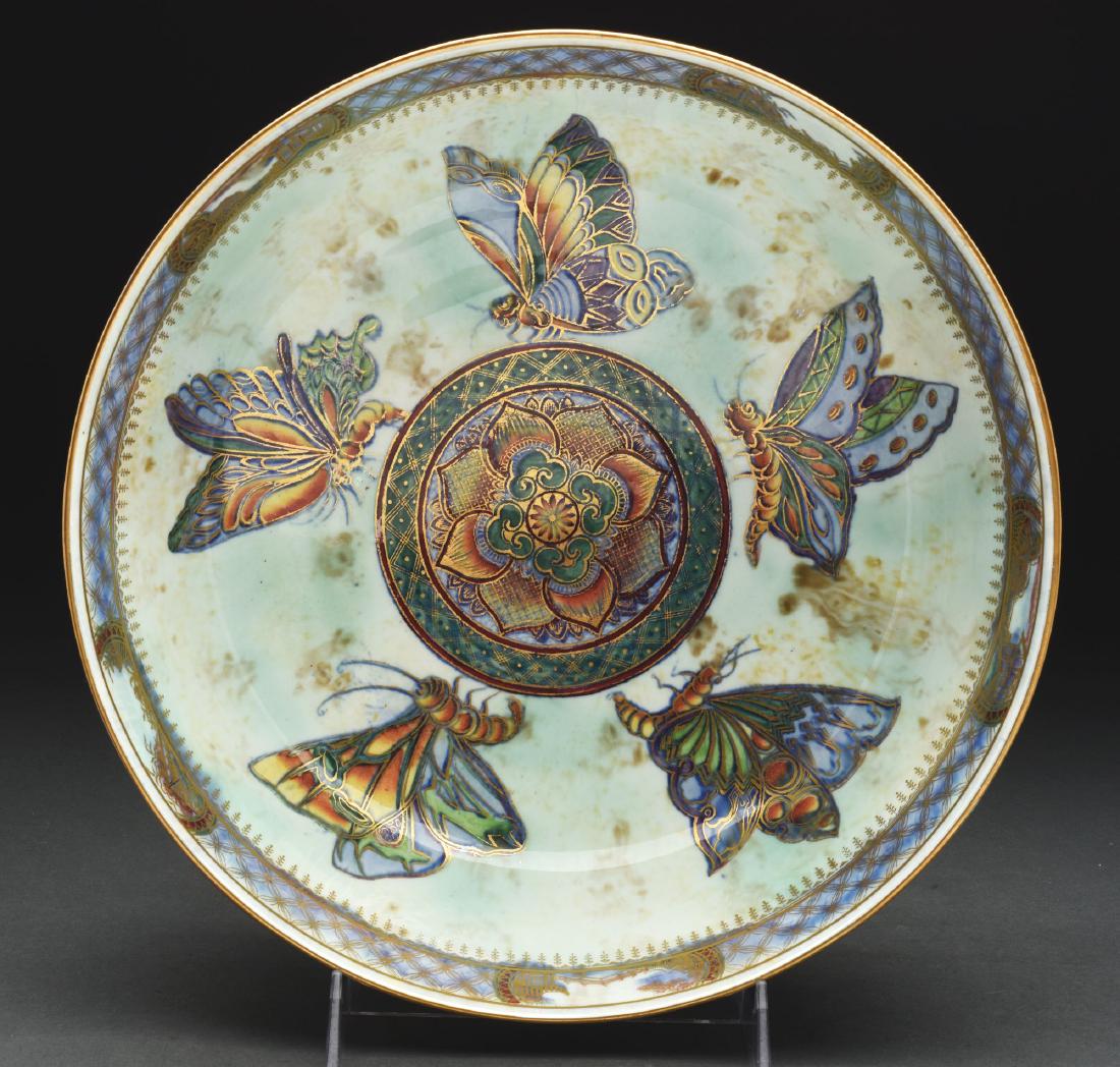 Large Wedgwood Butterfly Lustre Bowl.: Large Wedgwood bowl is decorated with orange and blue mottled lustre on the exterior, further decorated with five gilded butterflies encircling the vase, the interior decorated with five vibrantly col
