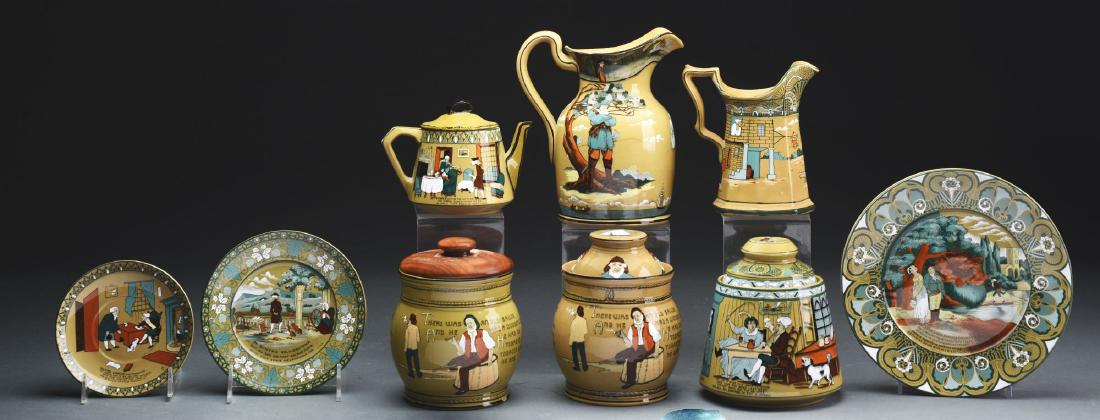 Lot of 10: Dr. Syntax Emerald Deldare with Three: 1908-1911, Buffalo New York. All pieces have a Buffalo Pottery underglaze stamp, most are dated. This lot includes Dr. Syntax humidor, milk pitcher, tea pot, saucer, and three plates. All Emerald Deld