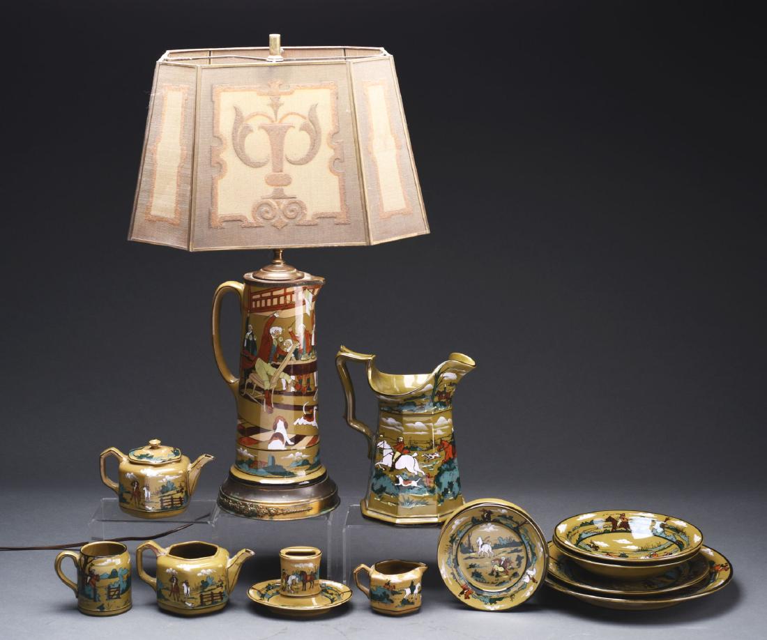 Group of Buffalo Deldare Pottery Assorted Objects of: Group consisting of one tankard pitcher, now fitted as a lamp "The Hunt Supper, A Toast To All", no date visible, artist signed "W. Folter", 28" tall with shade, tankard 12" high, very good condition.