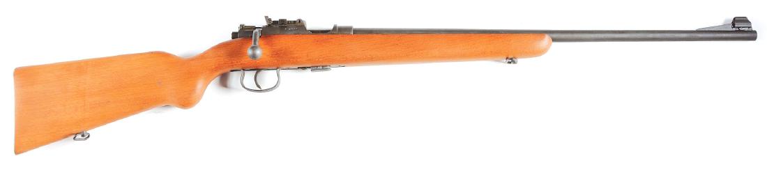 (C) Military Type MAS 45 .22 Caliber Bolt Action Rifle.: Manufactured in France as a military type training rifle, this rifle features the following: round barrel, hooded ramp front sight, military style rear sight, bolt action, Mauser release, single trigg