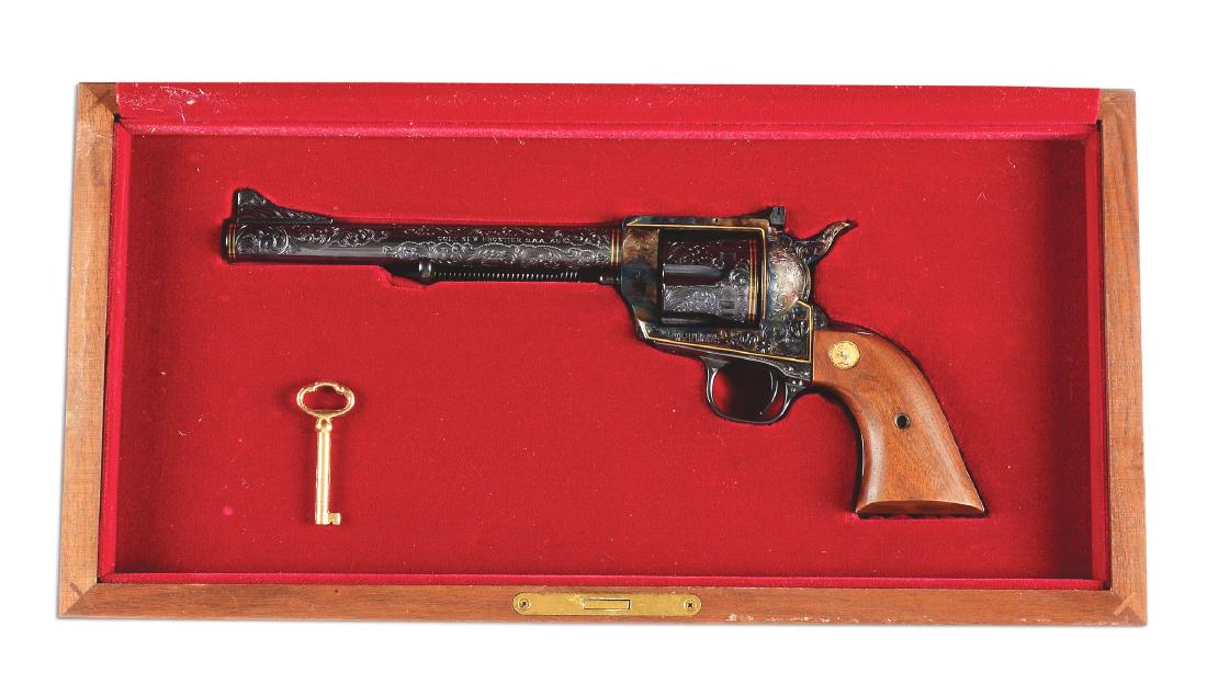 (M) Engraved Colt New Frontier Single Action Revolver: This exquisitely engraved Colt features nearly full coverage C+ engraving with scroll and punch dot background. The left recoil shield has an engraved bald eagle, top of backstrap has an American flag