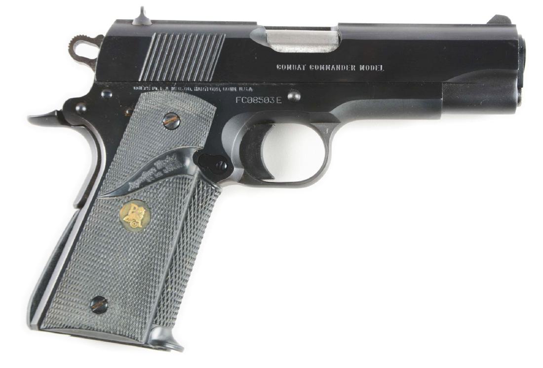 (M) Cased Colt Combat Commander Mk IV Series 80: Basic features of a shortened Model 1911 to include blued finish, white dot sights, wide rib, beveled ejection port, beaver tail safety, lightweight bobbed hammer, black rubber grips. CONDITION: As ne
