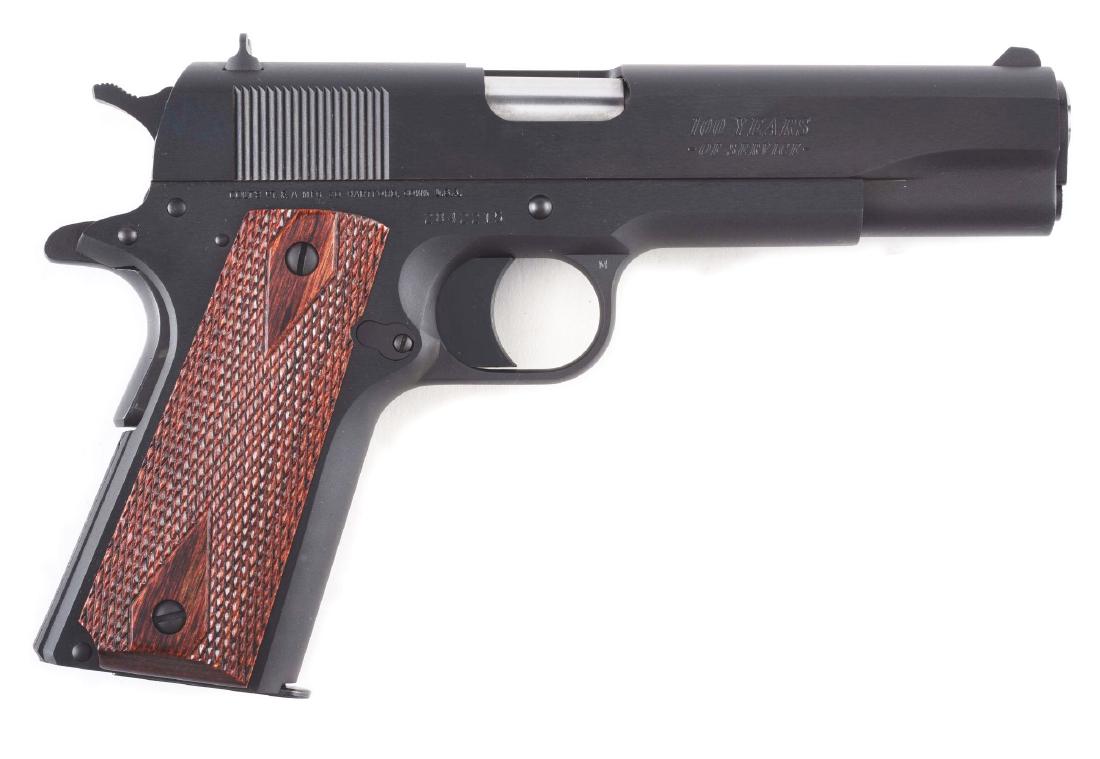 (M) Colt Government Model Semi-Automatic Pistol with: Colt Government Model 1911 with the following features: 5" barrel expertly mated to a bushing, round top slide, three dot combat sights, spur hammer, Series 80 style slide with firing pin block, rear 